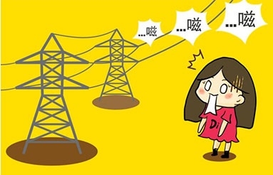 Why does the high-voltage line buzz on a rainy day?